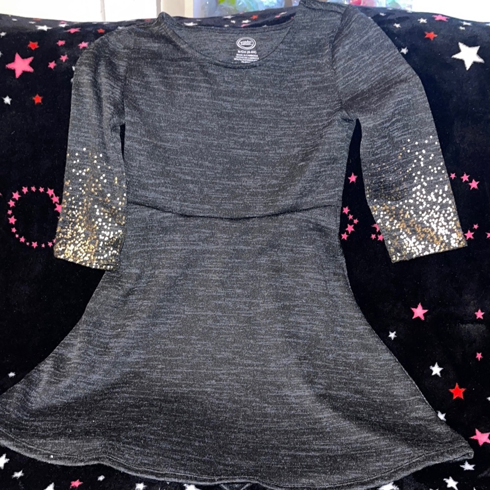 A line Dress size 6-6X never worn, no tags. Black with gold speckles on specks